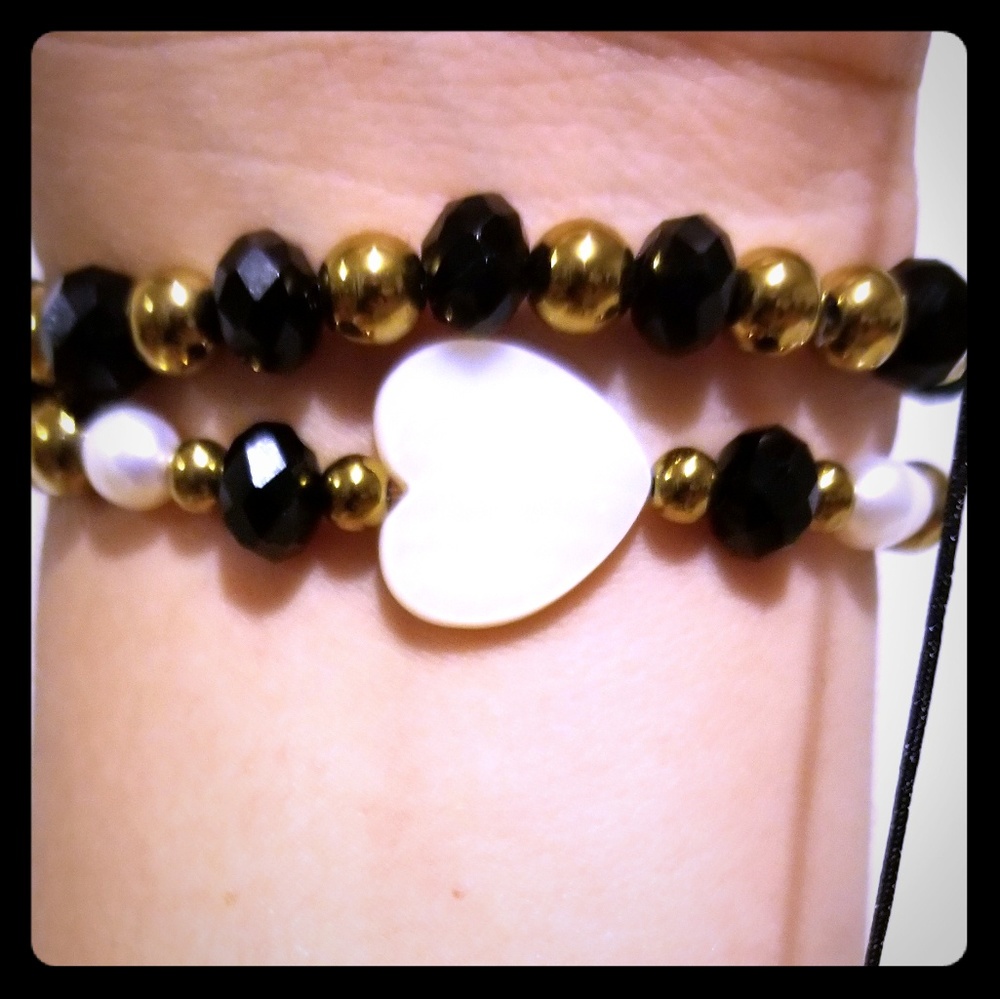 Two Black & Gold Bracelets
